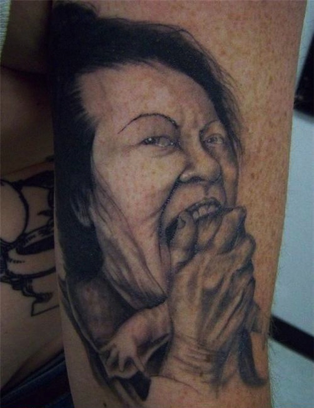 Страшные татуировки. Фото 36